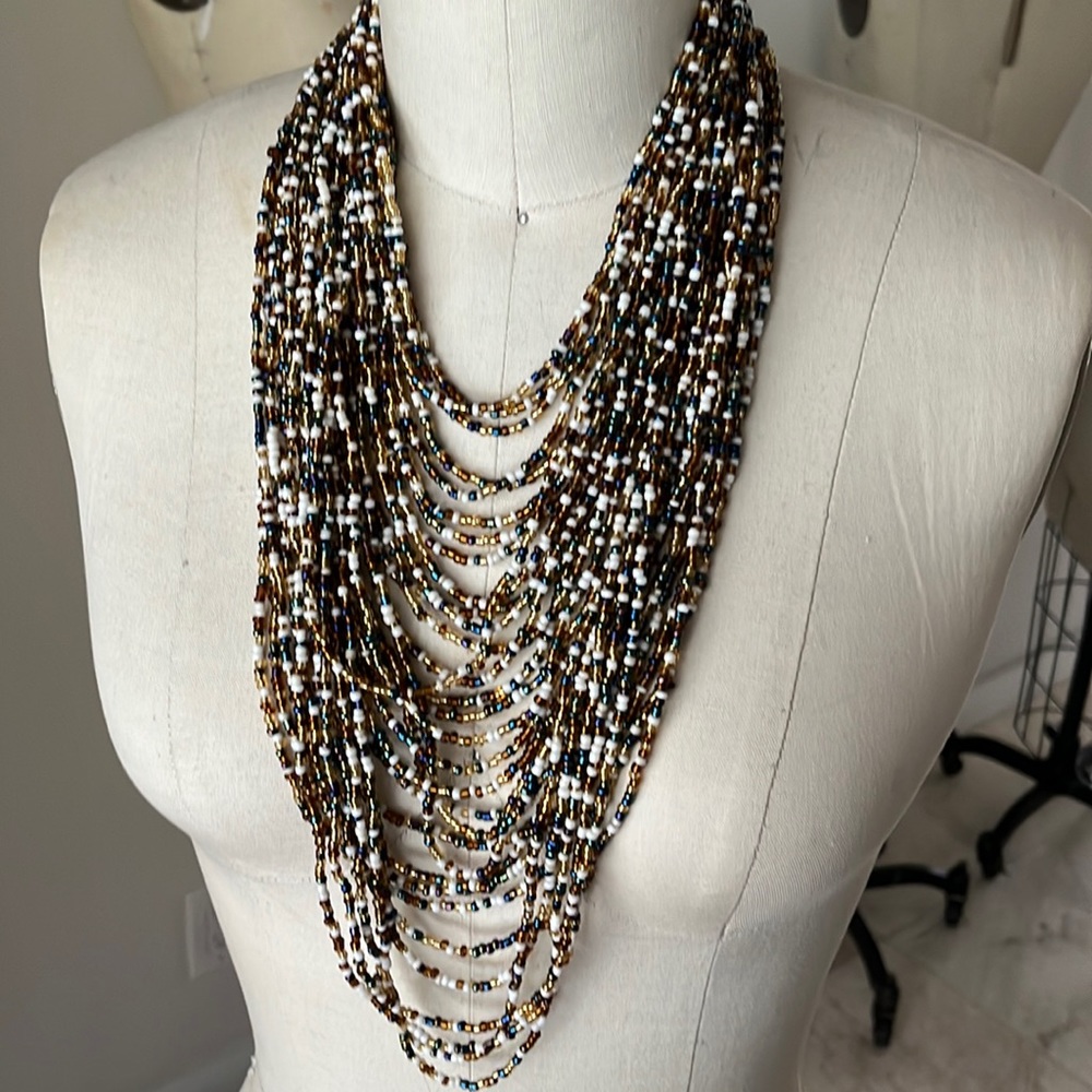 Multi layered bead necklace, never worn, excellent condition.